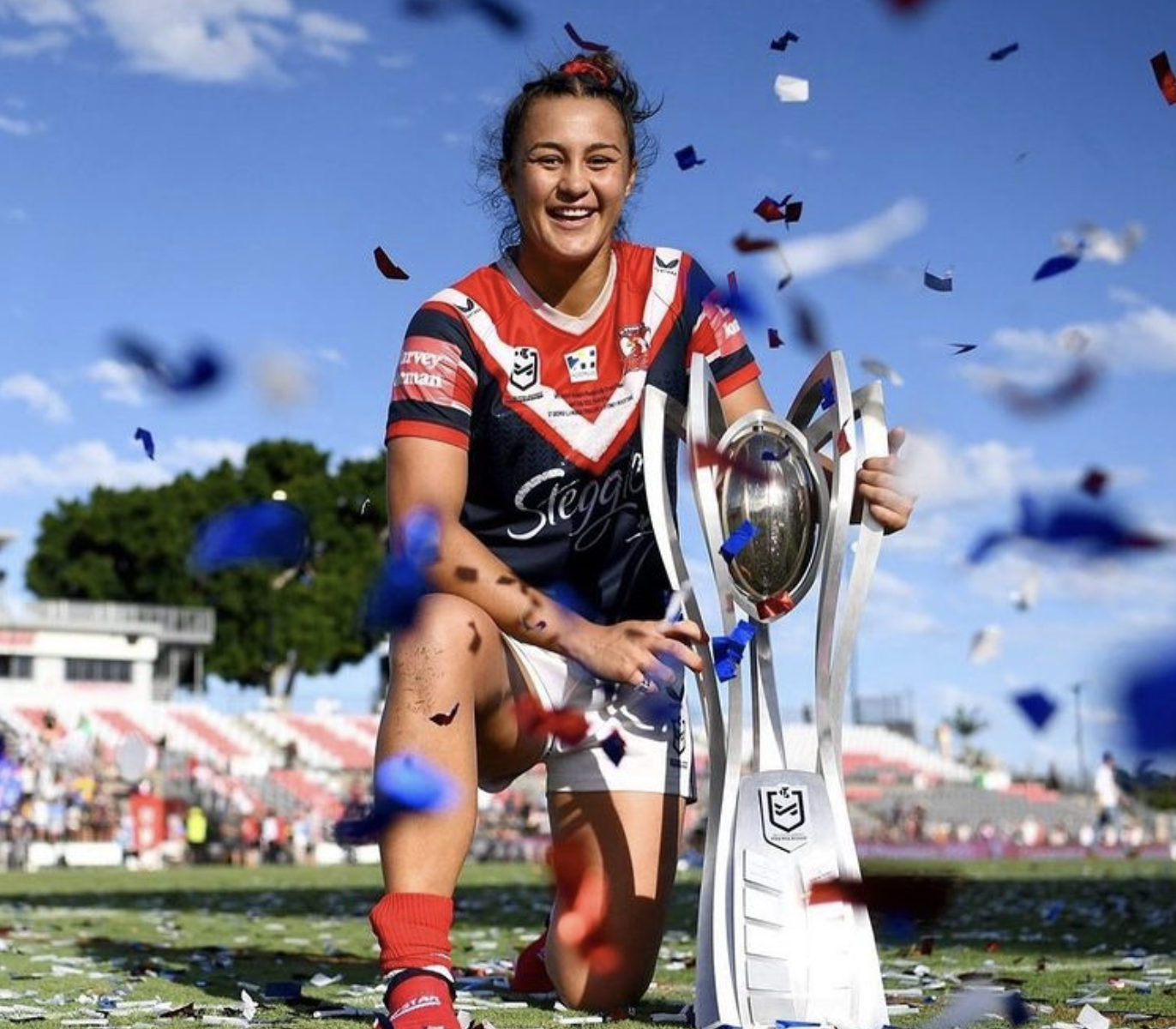 Corban Baxter with the NRLW Trophy after the Grand Final in Redcliffe